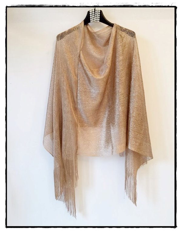 Poncho dorato in retina di lurex con frange.