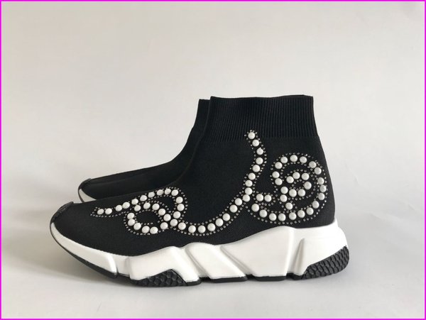 Sneakers calza nere con applicazioni bianche .