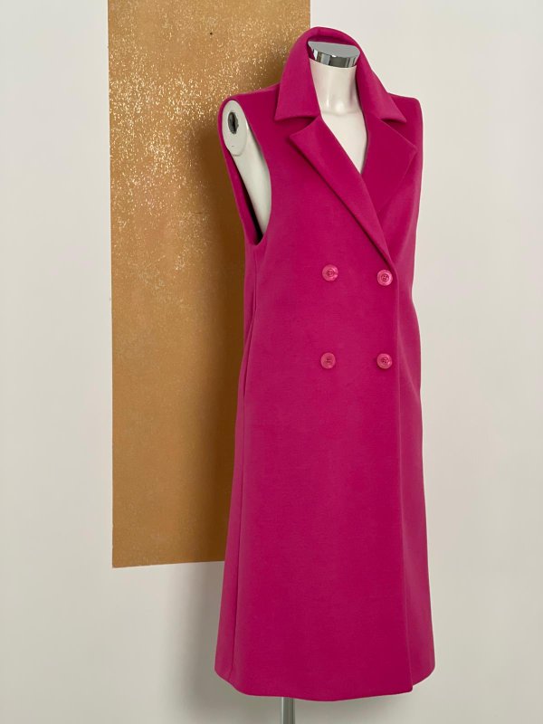 Cappottino gilet fucsia doppiopetto. 