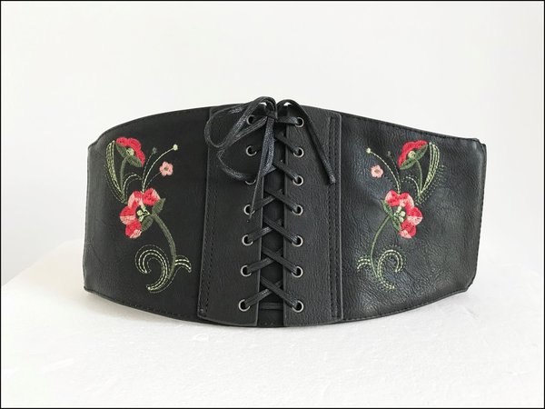 Cintura in pelle nera alta, con fiori e intrecci elasticizzata dietro. ( H  cm 17 )