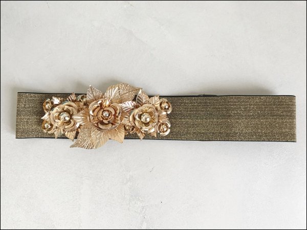 Cintura dorata elasticizzata con fiori applicati. ( H cm 6 )
