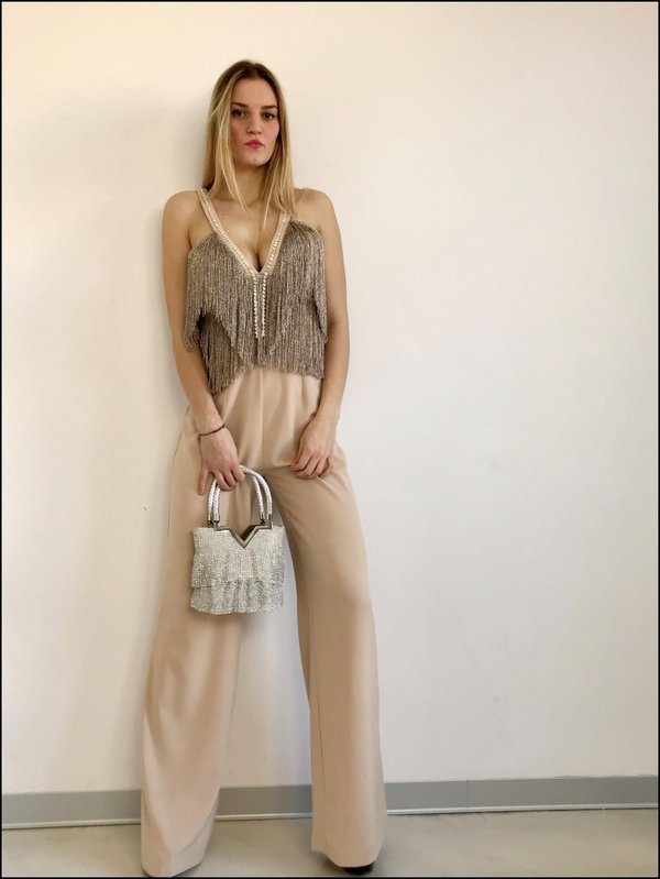 Frange e swarovski per questa jumpsuit a palazzo Gil Santucci.